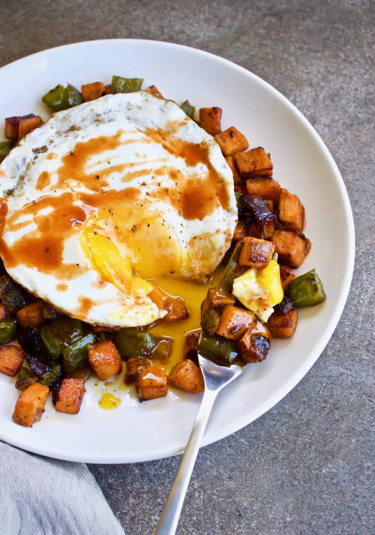 Chipotle Sweet Potato Hash with Fried Eggs - Yummy Noises