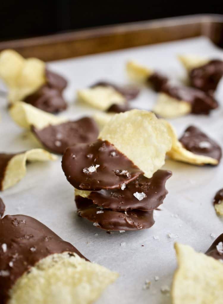 Salted dark chocolate dipped kettle chips stacked on each other