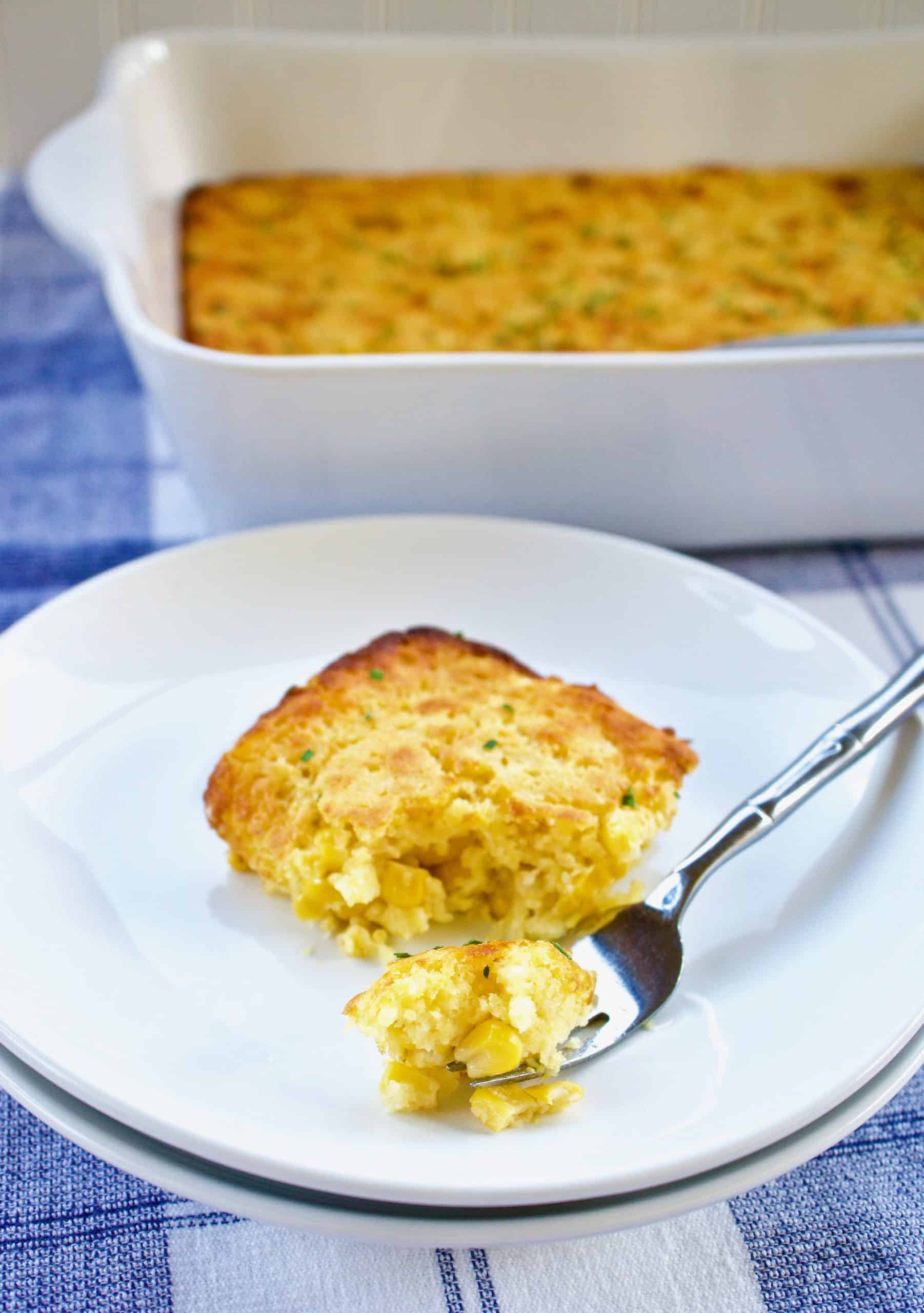 Forkful of Southern corn pudding on a plate