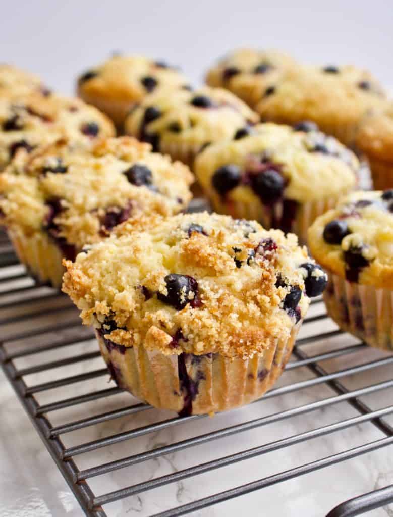 Closeup view of blueberry lemon muffin with crumble topping