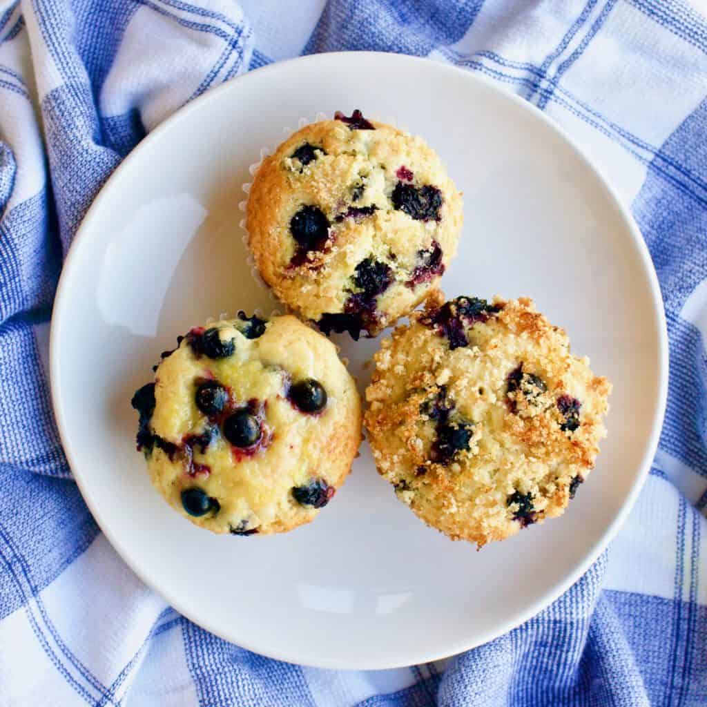 Overhead view of blueberry lemon muffins three ways