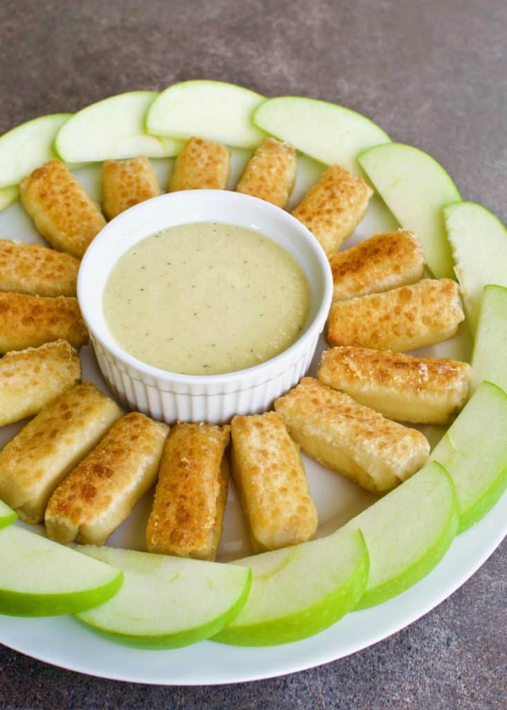Crispy brie spring rolls with green apple vinaigrette