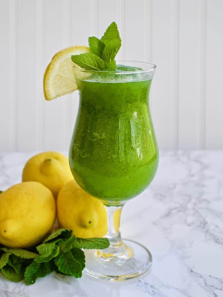 Frozen Mint Lemonade with mint sprig and lemon slice