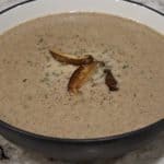 Creamy mushroom soup served in a bowl