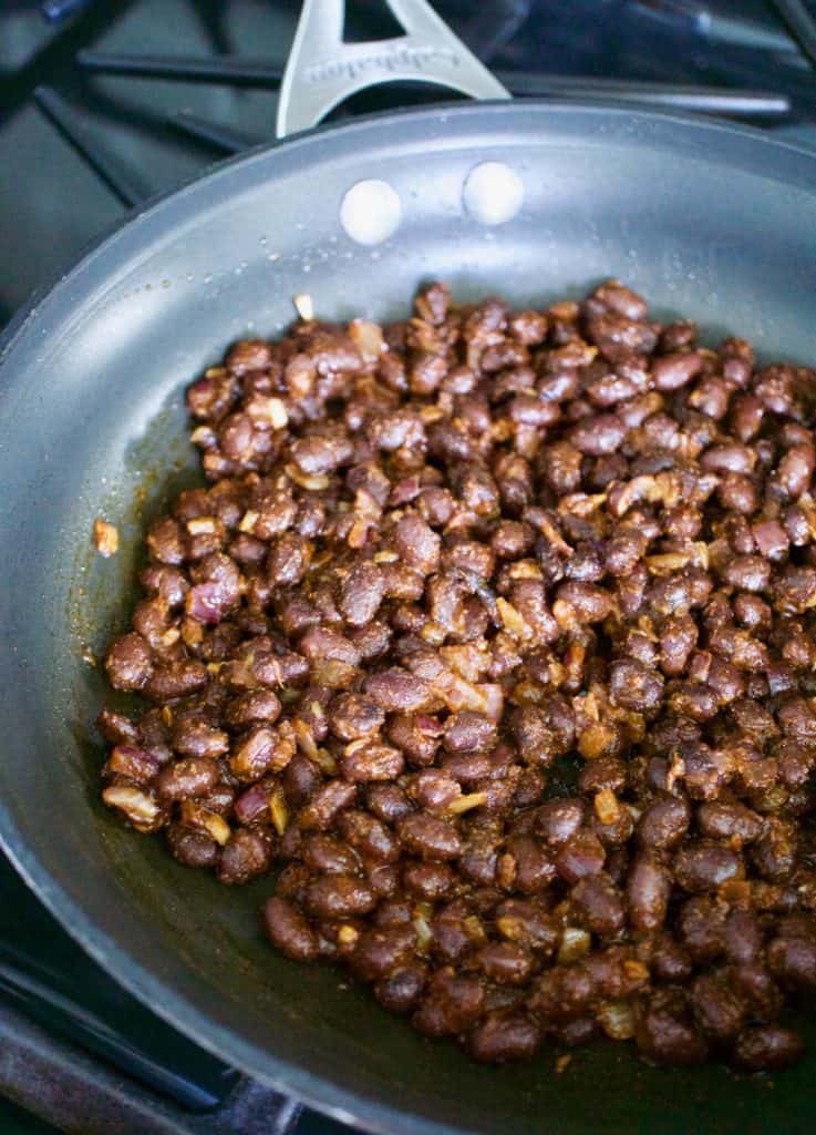 black beans cooking in pan