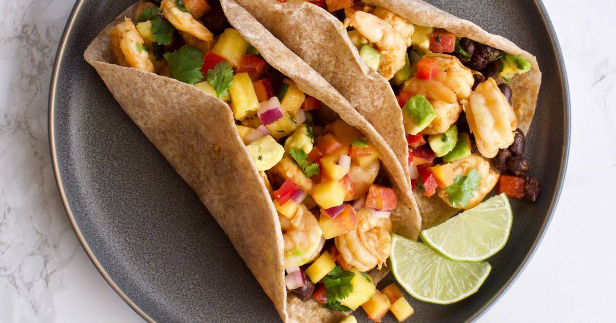 Chipotle Lime Shrimp Tacos with Pineapple Peach Salsa - Yummy Noises